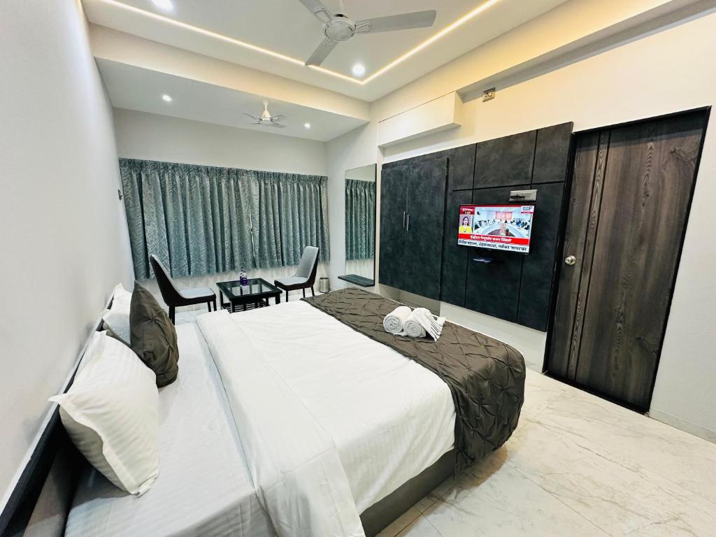 TV a/nebo společenská místnost v ubytování Hotel Diamond Executive