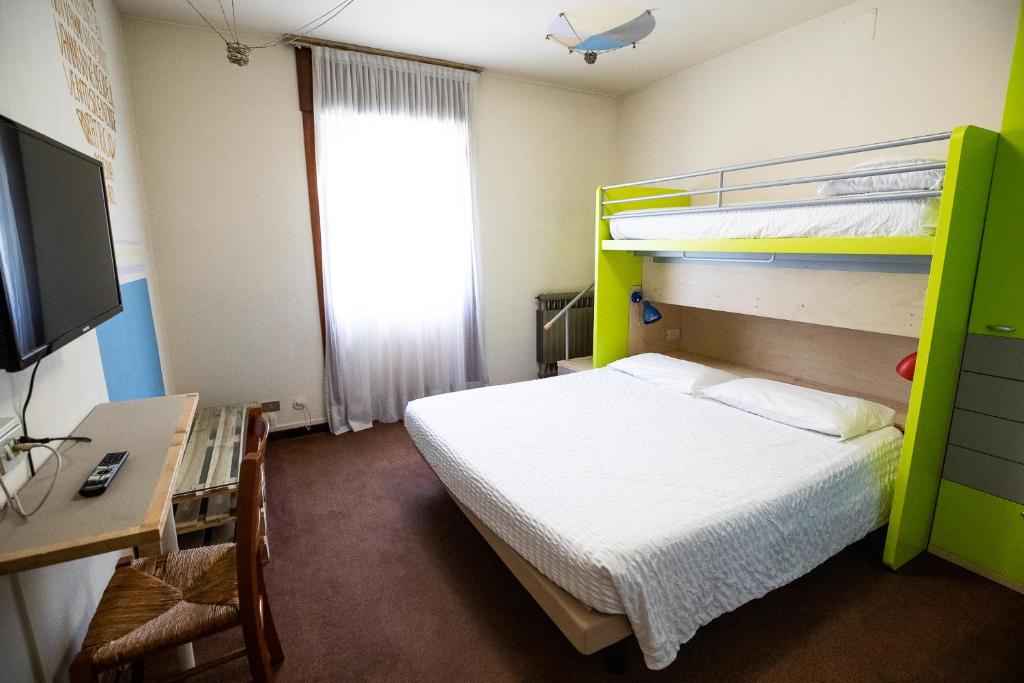 Postel nebo postele na pokoji v ubytování Hotel Rendez Vous