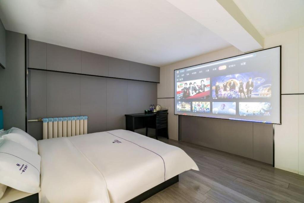 Dequan Hotel chaoyang high speedtrain of China Branch客房内的一张或多张床位