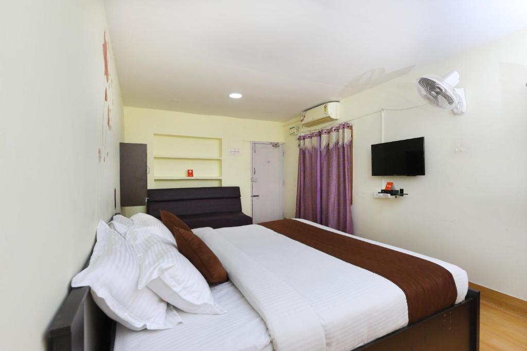 Postel nebo postele na pokoji v ubytování Hotel O India Gate Par View