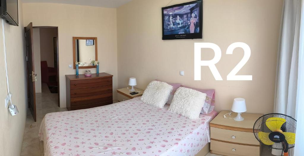Postel nebo postele na pokoji v ubytování guesthouse emaly