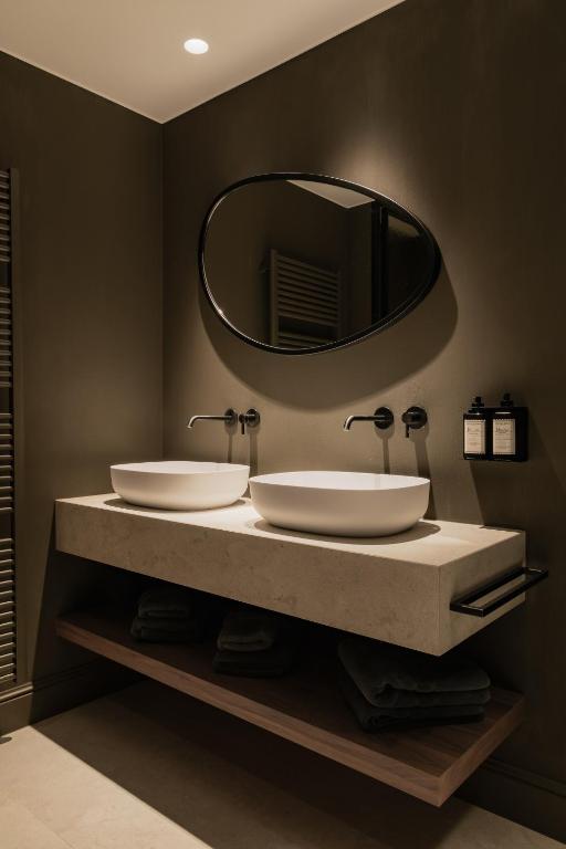 Koupelna v ubytování B&B Herenhuis
