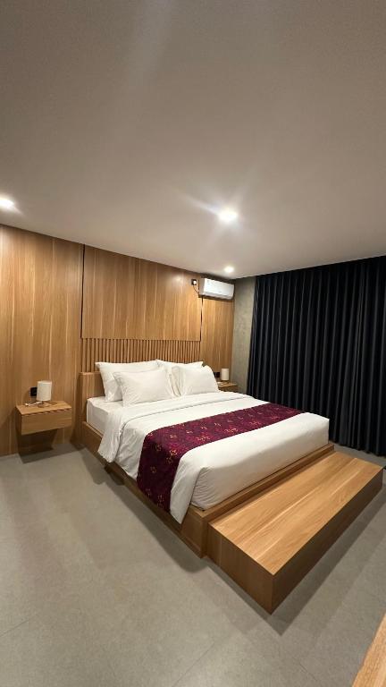 Postel nebo postele na pokoji v ubytování Widji Garden Villa