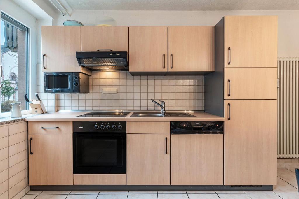 Kuchyň nebo kuchyňský kout v ubytování Ferienwohnung Faller