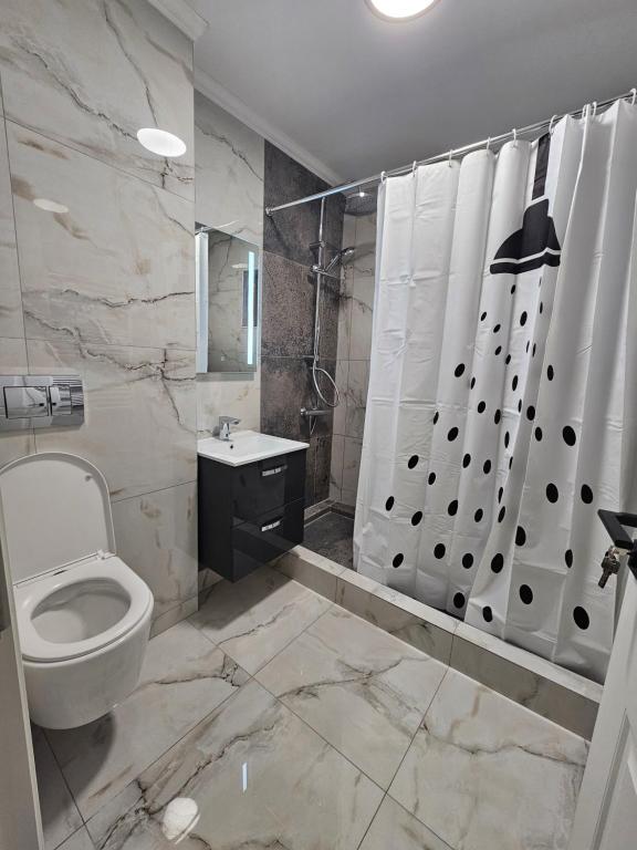 Koupelna v ubytování DIDI Apartament