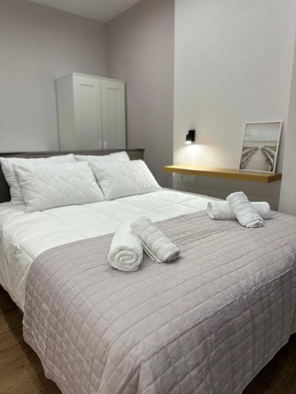 Postel nebo postele na pokoji v ubytování ΝΝ Delphi Loft