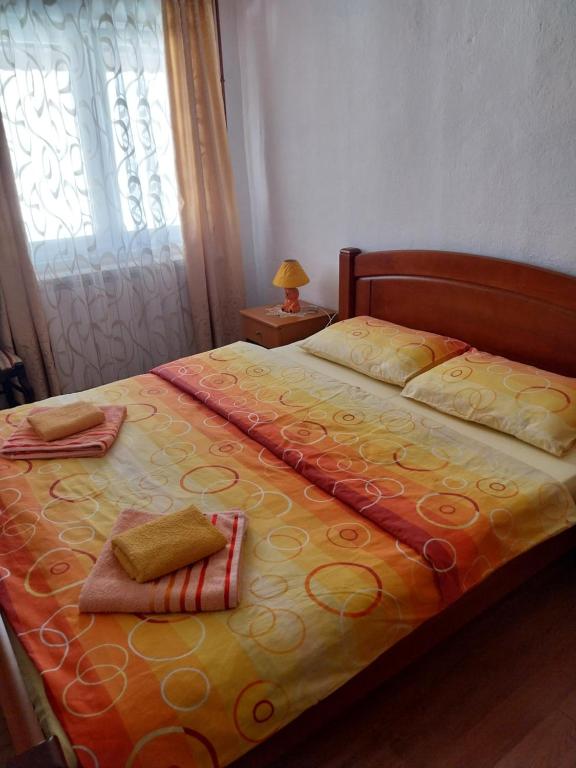 Postel nebo postele na pokoji v ubytování Rent a rooms - "Laki"