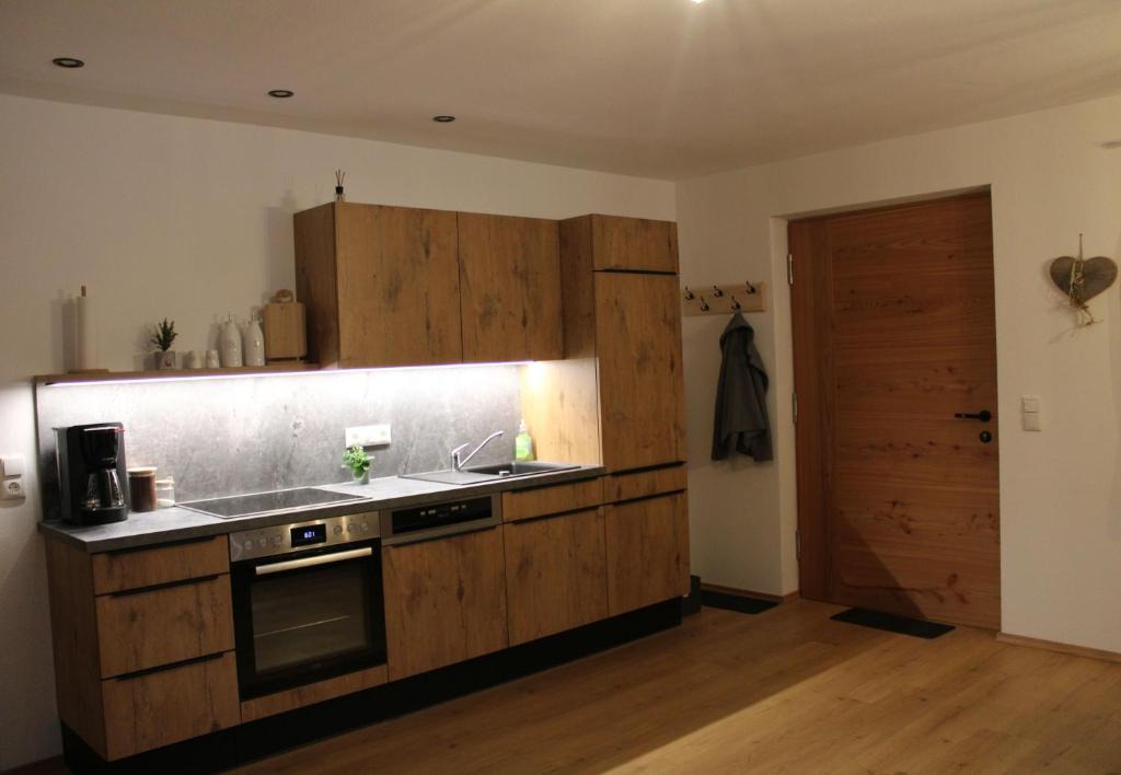 Kuchyň nebo kuchyňský kout v ubytování Ferienwohnung Enzian