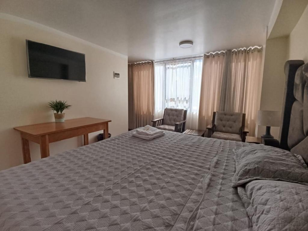 Postel nebo postele na pokoji v ubytování casa SKALA