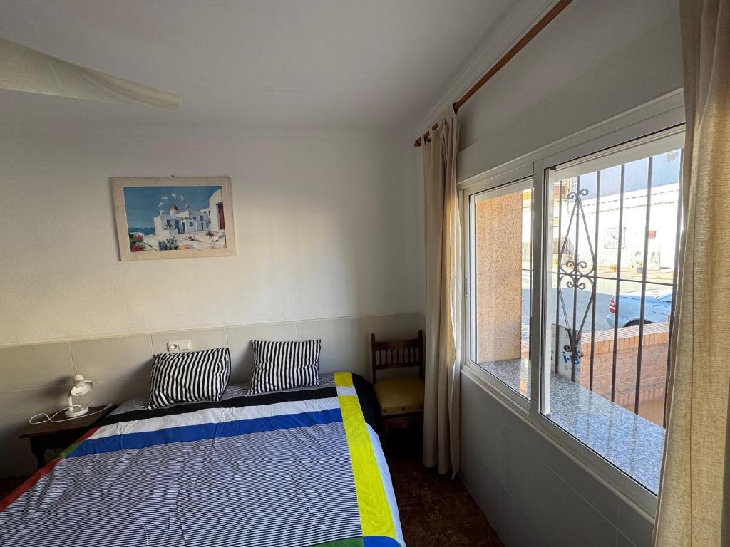 Postel nebo postele na pokoji v ubytování Beach House in Puntas de Calnegre