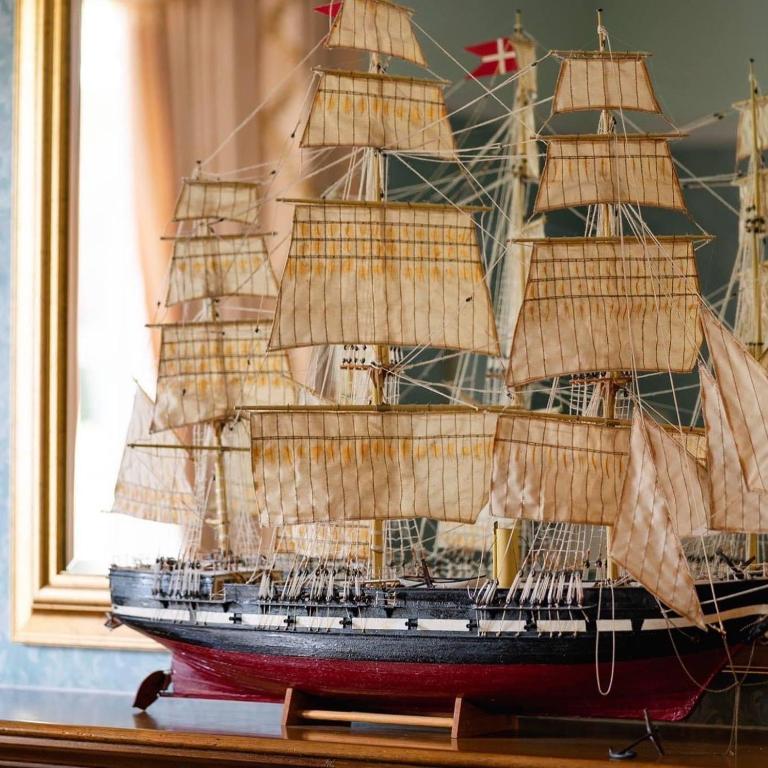 a model of a pirate ship sitting on a table at Balincourt in Bournemouth