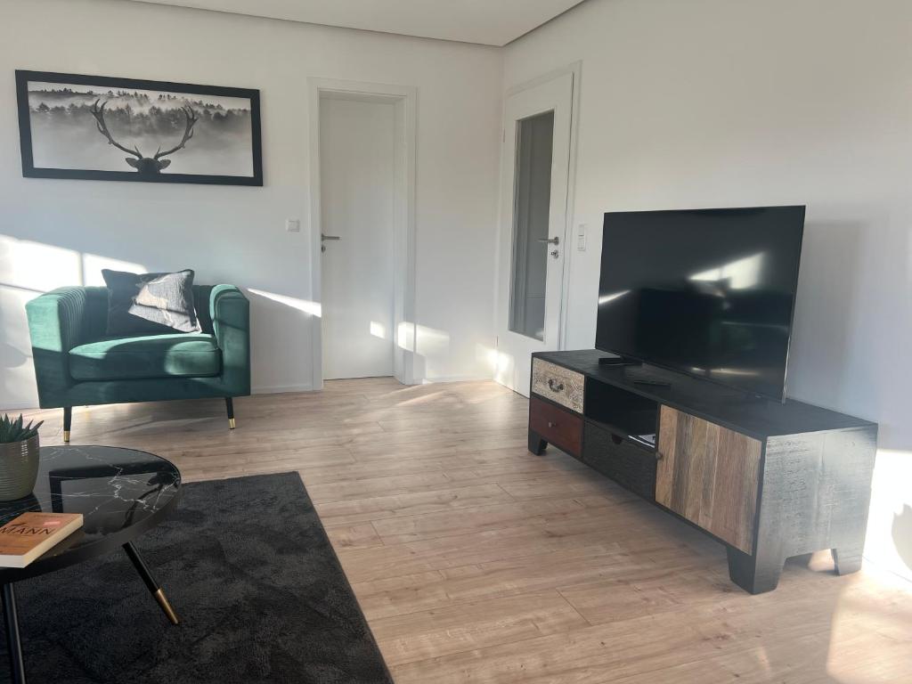 TV a/nebo společenská místnost v ubytování Allgäu Outblick