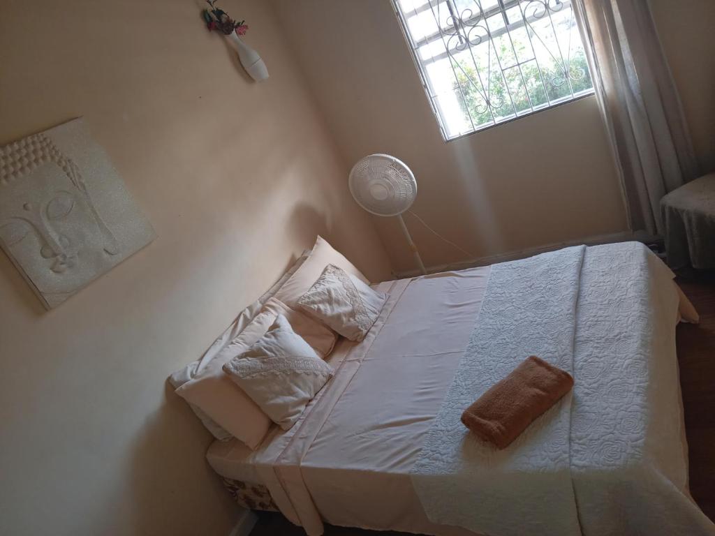 Postel nebo postele na pokoji v ubytování Chandler Homestay