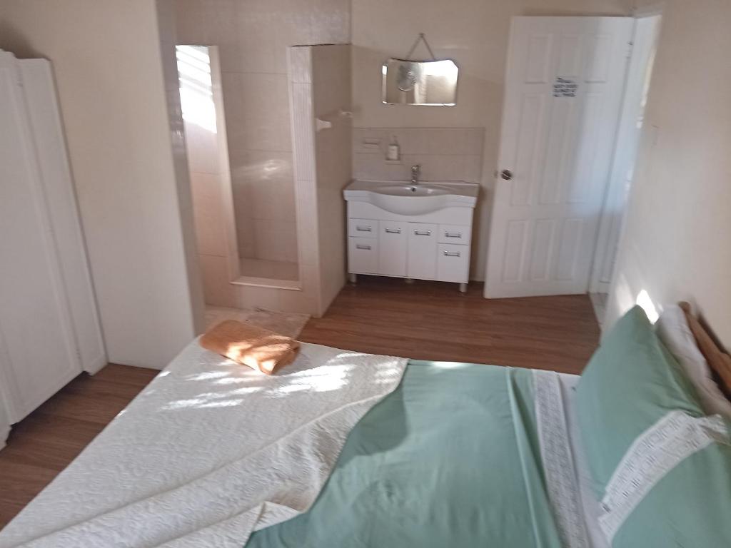 Postel nebo postele na pokoji v ubytování Chandler Homestay