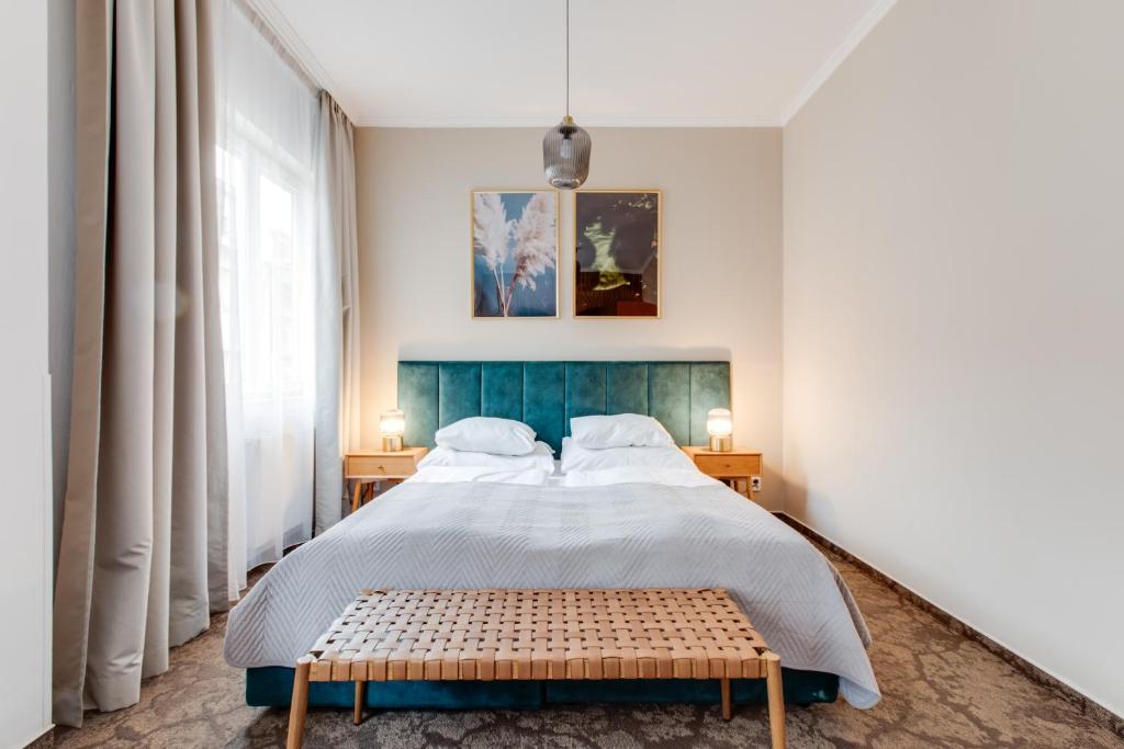Postel nebo postele na pokoji v ubytování Hotel Andante