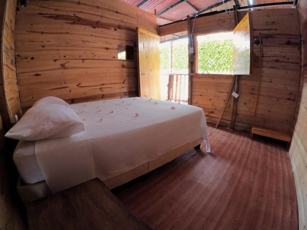 Postel nebo postele na pokoji v ubytování Eco hotel Mar De Ensueño