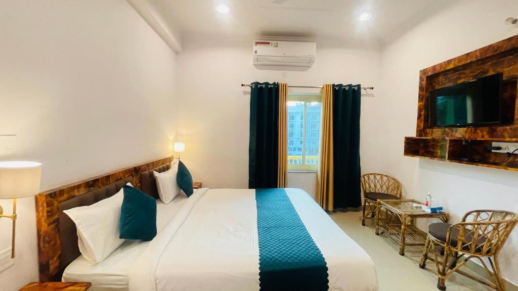 Postel nebo postele na pokoji v ubytování GreenDay Escapes Rishikesh