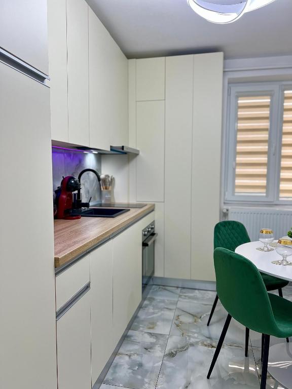 Kuchyň nebo kuchyňský kout v ubytování QuickStay - Apartment Straja - Lupeni