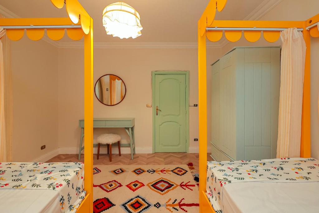 Postel nebo postele na pokoji v ubytování Heliopolis Boutique - 3 BR Apt Centrally located at City Stars