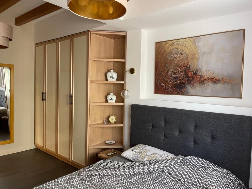 Postel nebo postele na pokoji v ubytování Sunlight Apartment