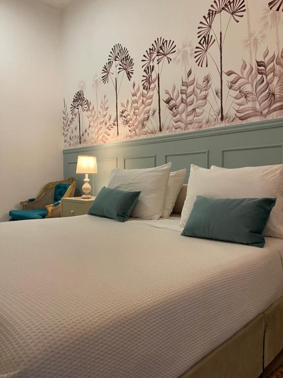 Ένα ή περισσότερα κρεβάτια σε δωμάτιο στο Axagua Hotel Boutique