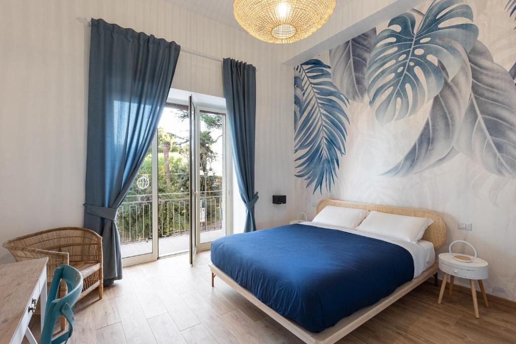 Postel nebo postele na pokoji v ubytování B&B Vitruvio Suites
