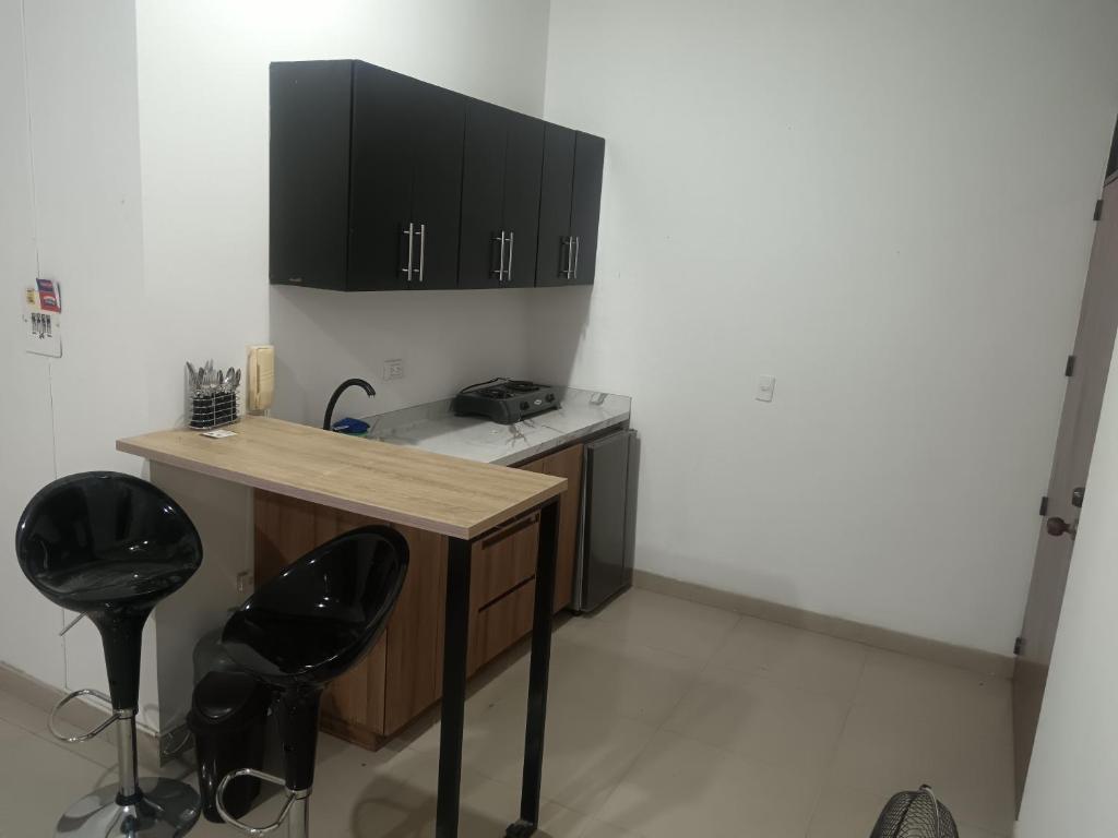 Kuchyň nebo kuchyňský kout v ubytování Económico práctico central