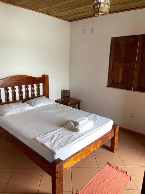 Postel nebo postele na pokoji v ubytování Guava Hostel Serra Grande