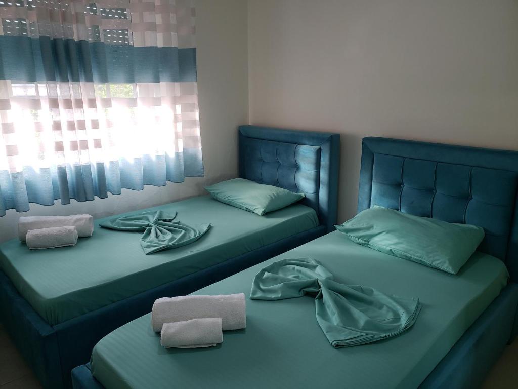 Postel nebo postele na pokoji v ubytování Malsi's, Private Room with shared bathroom and kitchen