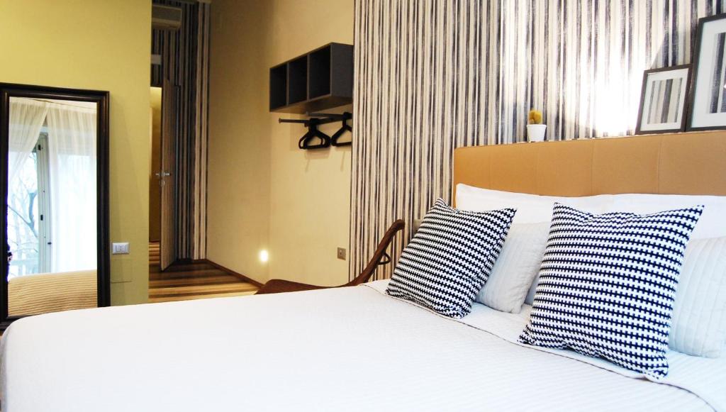 Posteľ alebo postele v izbe v ubytovaní Serendipity Rooms