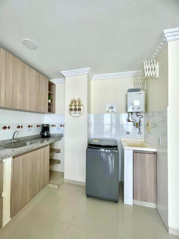 Kuchyň nebo kuchyňský kout v ubytování Moderno y acogedor apartamento en Ibague