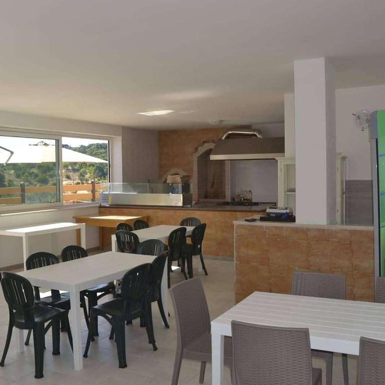 Kuchyň nebo kuchyňský kout v ubytování Villa Uria monolocali con e senza angolo cottura