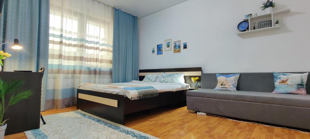 Giường trong phòng chung tại EmmaApart Comfort 5