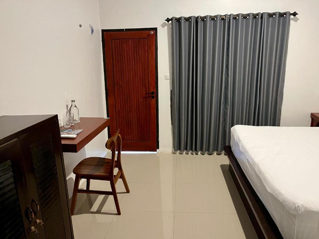 Postel nebo postele na pokoji v ubytování Eternal Rooms