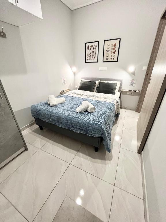 Postel nebo postele na pokoji v ubytování BlueLine apartment 3