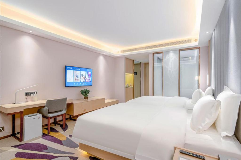 Postel nebo postele na pokoji v ubytování Lavande Hotel Xi'an Xianyang International Airport Outlet