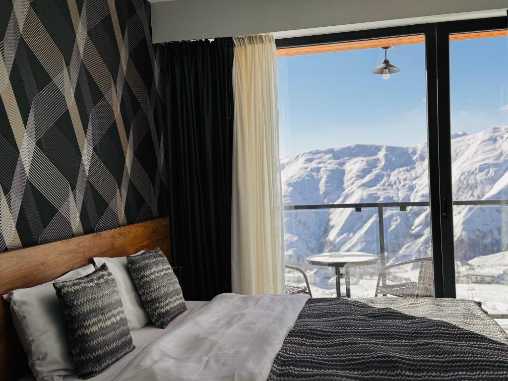 Nespecifikovaný výhled na hory nebo výhled na hory při pohledu z apartmánu