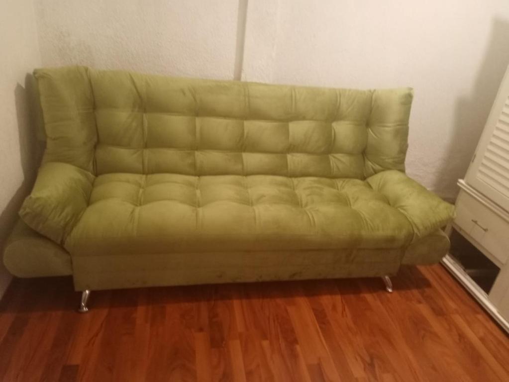 Ein Sitzbereich in der Unterkunft Amplio y cómodo departamento