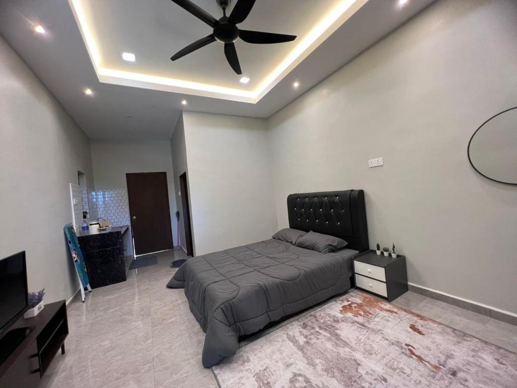 TV a/nebo společenská místnost v ubytování Rimbunan Padi Roomstay