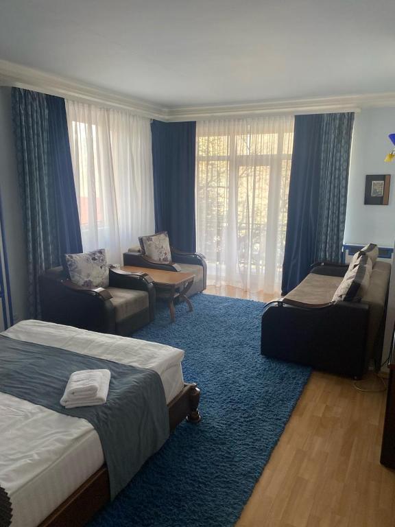 Postel nebo postele na pokoji v ubytování Casanova Inn - Boutique Hotel