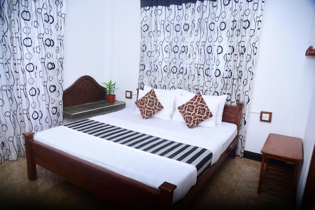 Postel nebo postele na pokoji v ubytování Travel rest inn