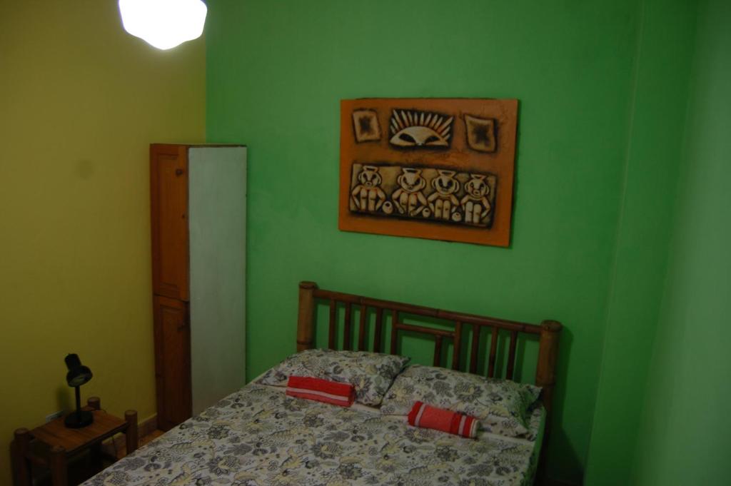 Postel nebo postele na pokoji v ubytování La Choza Guesthouse