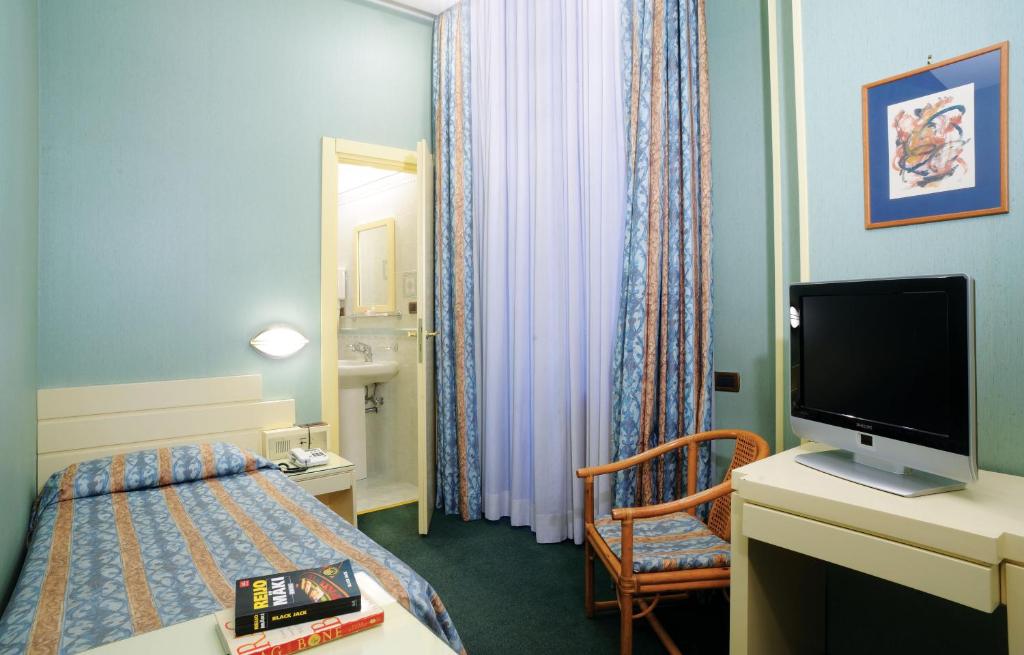 TV a/nebo společenská místnost v ubytování Hotel Patria