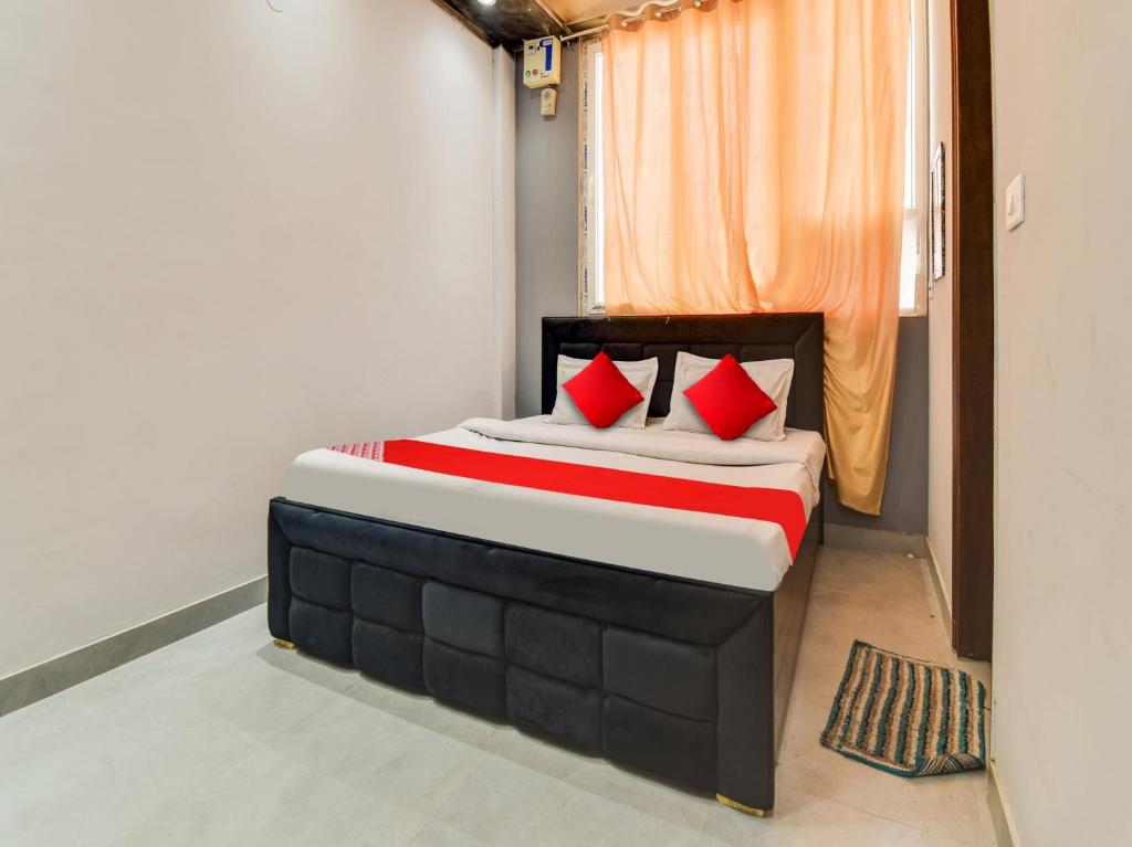 Postel nebo postele na pokoji v ubytování Hotel O Iris Lite