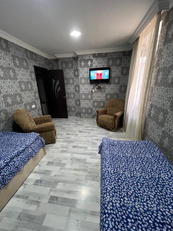 Posezení v ubytování Ruslan Hotel 1