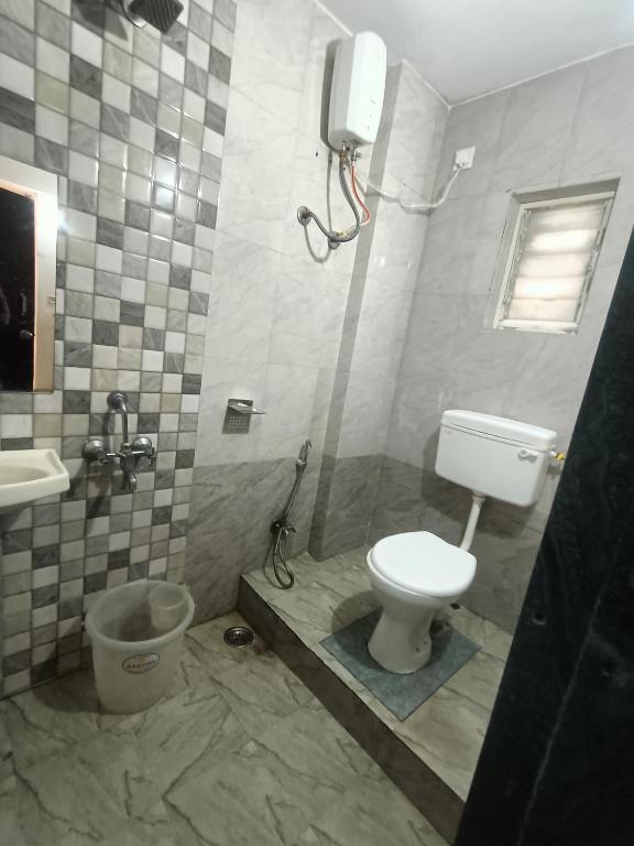 Koupelna v ubytování Hotel Silverleaf Residency