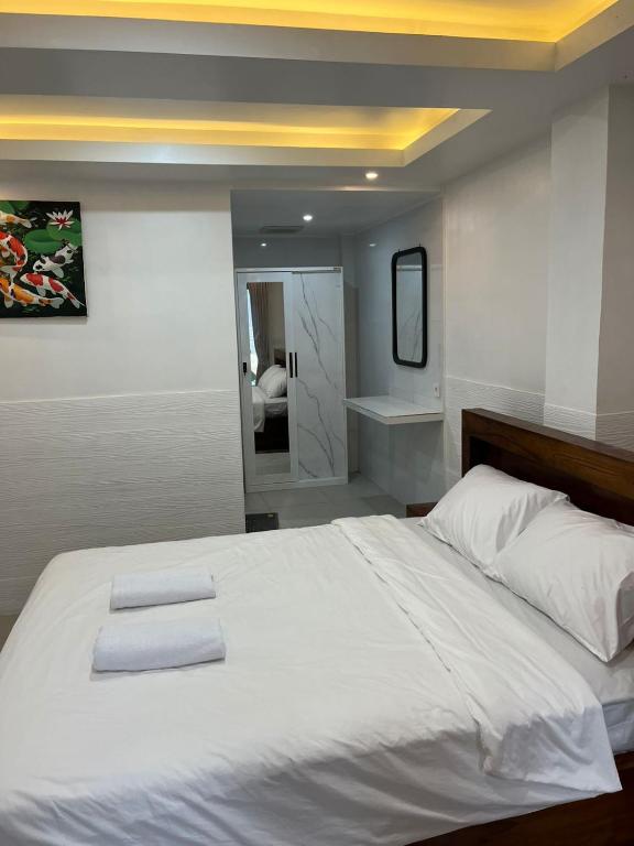 Postel nebo postele na pokoji v ubytování Gusti Room II