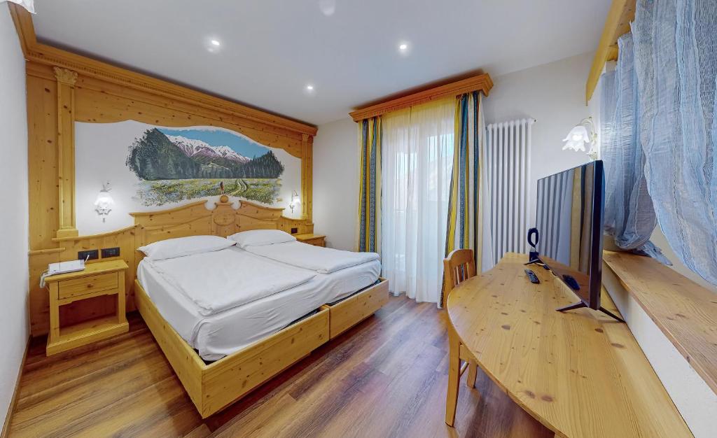 TV a/nebo společenská místnost v ubytování Hotel Madonna delle Nevi