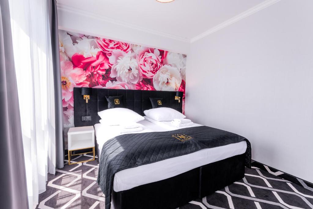 Posteľ alebo postele v izbe v ubytovaní Hotel Lantier Wellness & Spa
