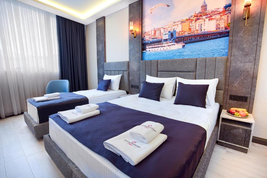 Comfort Point Two Hotel - Superior Family Room